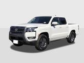 Photo of 2025 Glacier White Nissan Frontier