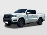Photo of 2025 Glacier White Nissan Frontier