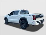 Thumbnail of 2025 Glacier White Nissan Frontier