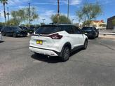 Thumbnail of 2023 Aspen White Tricoat/Super Black Nissan Kicks