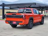 Thumbnail of 2025 Afterburn Orange Nissan Frontier