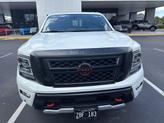 Thumbnail of 2024 Glacier White Nissan Titan