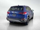Thumbnail of 2022 Dusk Blue Metallic Volkswagen Taos