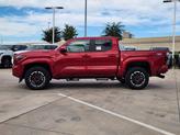 Thumbnail of 2025 Supersonic Red Toyota Tacoma
