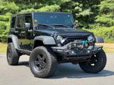 Thumbnail of 2016 Black Clearcoat Jeep Wrangler Unlimited