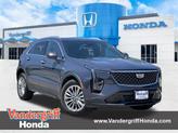 Photo of 2024 Midnight Sky Metallic Cadillac XT4