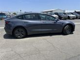Thumbnail of 2023 Midnight Silver Metallic Tesla Model 3