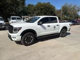 Thumbnail of 2023 Glacier White Nissan Titan