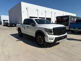 Thumbnail of 2023 Glacier White Nissan Titan