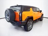 Thumbnail of 2024 Afterburner Tintcoat (Orange) GMC HUMMER EV SUV
