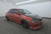 Photo of 2006 Rotor Glow Metallic Mitsubishi Lancer Evolution