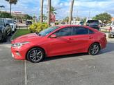 Thumbnail of 2023 Currant Red Kia Forte