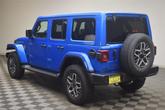 Thumbnail of 2025 Hydro Blue Pearl Jeep Wrangler