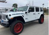 Photo of 2022 White Jeep Wrangler Unlimited 4xe