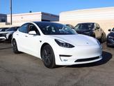 Photo of 2021 Pearl White Multi Tesla Model 3