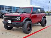 Photo of 2025 Ruby Red Metallic Tinted Clearcoat Ford Bronco
