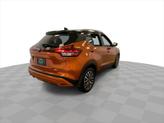 Thumbnail of 2023 Monarch Orange Metallic/Super Black Nissan Kicks