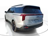 Thumbnail of 2025 Ivory Silver Kia Carnival Hybrid
