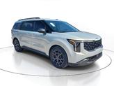 Thumbnail of 2025 Ivory Silver Kia Carnival Hybrid