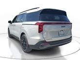 Thumbnail of 2025 Ivory Silver Kia Carnival Hybrid