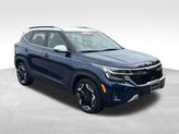Thumbnail of 2024 Dark Ocean Blue/White Roof Kia Seltos
