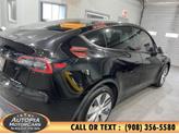 Thumbnail of 2023 Solid Black Tesla Model Y