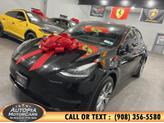 Thumbnail of 2023 Solid Black Tesla Model Y