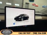 Thumbnail of 2023 Solid Black Tesla Model Y