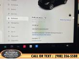 Thumbnail of 2023 Solid Black Tesla Model Y