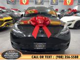 Thumbnail of 2023 Solid Black Tesla Model Y