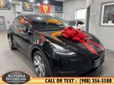 Thumbnail of 2023 Solid Black Tesla Model Y