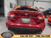Thumbnail of 2023 Ruby Flare Pearl Toyota Corolla