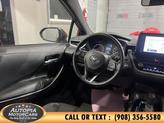 Thumbnail of 2023 Ruby Flare Pearl Toyota Corolla