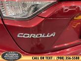 Thumbnail of 2023 Ruby Flare Pearl Toyota Corolla