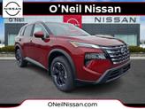 Photo of 2026 Scarlet Ember Tintcoat Nissan Rogue