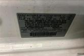 Thumbnail of 2023 Cloud White Nissan Versa