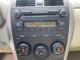 Thumbnail of 2010 Desert Sand Mica Toyota Corolla