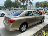 Thumbnail of 2010 Desert Sand Mica Toyota Corolla