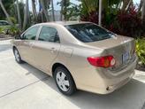 Thumbnail of 2010 Desert Sand Mica Toyota Corolla