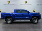 Thumbnail of 2024 Blue Crush Metallic Toyota Tacoma