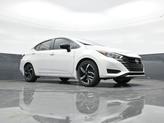 Thumbnail of 2025 Aspen White Tricoat Nissan Versa