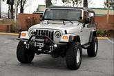 Photo of 2004 Bright Silver Metallic Jeep Wrangler