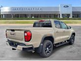 Thumbnail of 2023 Desert Sand Metallic GMC Canyon