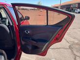 Thumbnail of 2015 Red Brick Nissan Versa
