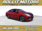 Photo of 2015 Red Brick Nissan Versa
