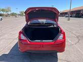 Thumbnail of 2015 Red Brick Nissan Versa
