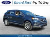 Photo of 2022 Stone Blue Metallic Ford Edge