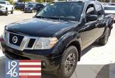 Photo of 2020 Magnetic Black Pearl Nissan Frontier