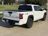Thumbnail of 2023 Glacier White Nissan Frontier