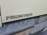 Thumbnail of 2014 Glacier White Nissan Frontier